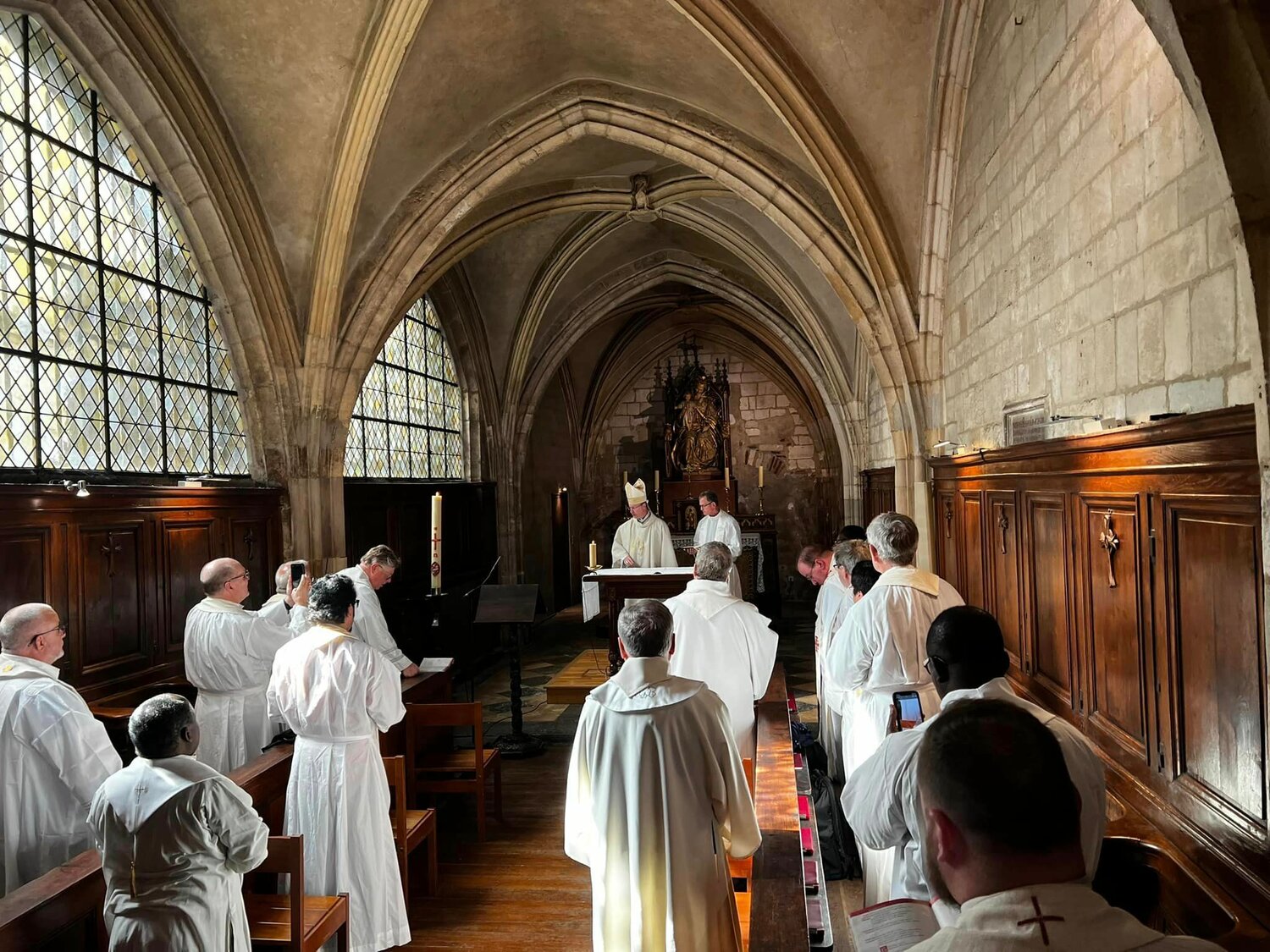 Twenty priests of the Jefferson City diocese gather for Mass with Bishop W. Shawn McKnight April 15 in the chapel of “La Providence,” the place they were staying during their pilgrimage and retreat in Ars-sur-Formans, France.